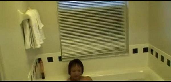  Horny Asian Granny Fucks her Cunt in the Hot Tube